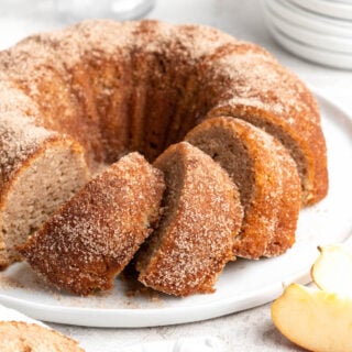 A close up of apple cider donut cake recipe ready to serve