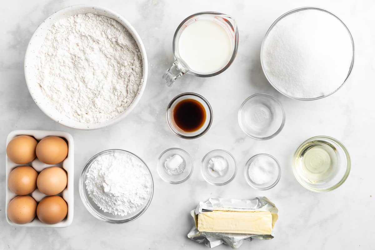 Ingredients to make Kentucky Butter Cake on the table before mixing together.