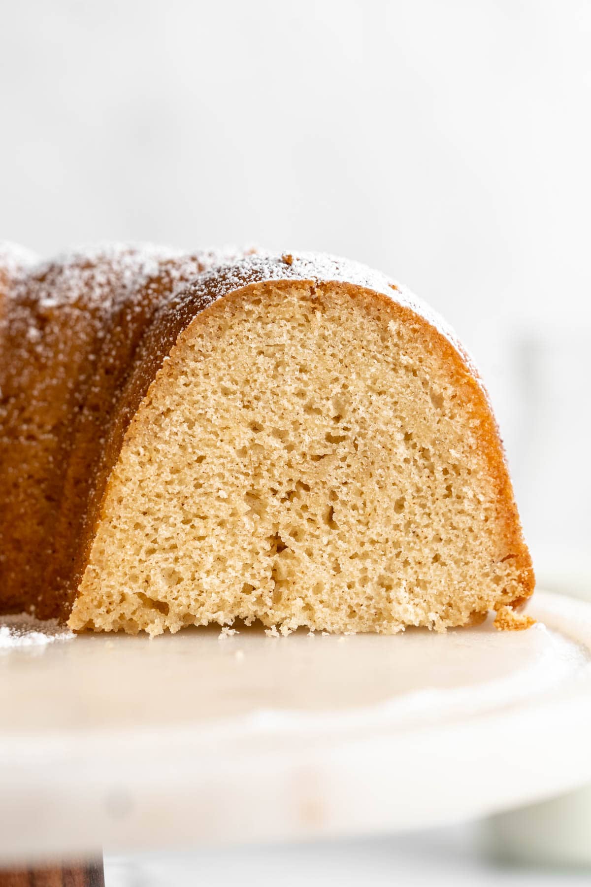 Close up of sliced Kentucky Butter Cake recipe cut across the cake to show the inside cake.