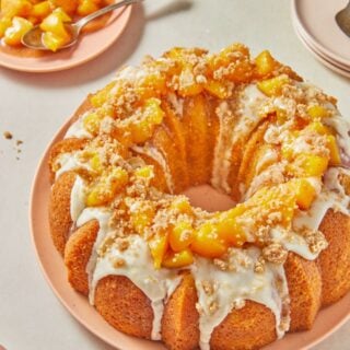 A peach cobbler pound cake ready to serve up